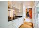 Chic bar area with granite countertops and ample cabinet space for mixing drinks and entertaining at 220 Glandon Dr, Chapel Hill, NC 27514