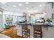 Contemporary kitchen with sleek countertops, stainless steel appliances, and bar seating at 220 Glandon Dr, Chapel Hill, NC 27514