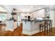 Elegant kitchen offers bar seating, stainless steel appliances, and ample counter space at 220 Glandon Dr, Chapel Hill, NC 27514