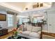 Open-concept living room showcases hardwood floors, kitchen access, and natural light at 220 Glandon Dr, Chapel Hill, NC 27514
