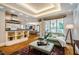 Open living area boasts natural light and views, seamlessly blending indoor and outdoor living at 220 Glandon Dr, Chapel Hill, NC 27514