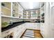 Spacious pantry with custom white cabinets and contrasting countertops provides ample storage space at 220 Glandon Dr, Chapel Hill, NC 27514
