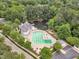 Aerial view of the community pool and surrounding neighborhood at 221 Mint Hill Dr, Cary, NC 27519