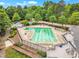 Aerial view of the community pool with chairs and tables at 221 Mint Hill Dr, Cary, NC 27519
