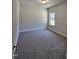Bright bedroom with a large window at 244 Kipling Crk Dr, Fuquay Varina, NC 27526