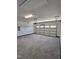 Spacious garage with a white door at 244 Kipling Crk Dr, Fuquay Varina, NC 27526