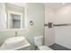 Updated bathroom featuring a vessel sink, modern fixtures, and a tiled walk-in shower at 2616 Wedgedale Ave, Durham, NC 27703