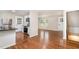 Stylish kitchen with white cabinets, granite countertops, and stainless steel appliances at 2616 Wedgedale Ave, Durham, NC 27703