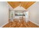 Open living space with beautiful wood floors and vaulted wood ceiling at 2616 Wedgedale Ave, Durham, NC 27703
