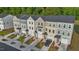 Aerial view of townhomes featuring neutral exteriors, attached garages, and well maintained landscaping at 2617 Chert Ln, Raleigh, NC 27610