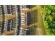 Aerial view of neighborhood of townhomes showcasing location near green space at 2617 Chert Ln, Raleigh, NC 27610