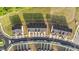 An aerial view of townhomes showcasing their location near a green space at 2617 Chert Ln, Raleigh, NC 27610