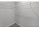 Walk-in closet with wire shelving for optimal organization and storage space at 2617 Chert Ln, Raleigh, NC 27610