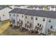 Recently built townhouses each feature small, private wooden decks on the back at 2617 Chert Ln, Raleigh, NC 27610