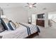 Bedroom with a dark wood bed, a full bathroom, and a view of an adjoining room at 330 Macallan Dr, Burlington, NC 27215