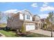 Brick two-story home with a two-car garage, manicured landscaping, and inviting curb appeal at 330 Macallan Dr, Burlington, NC 27215