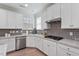 Efficient kitchen space with stainless steel appliances and ample countertop workspace at 330 Macallan Dr, Burlington, NC 27215