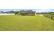 Large, verdant backyard showcasing a spacious lawn, ideal for Gathering activities and outdoor enjoyment at 3345 Little Creek Church Rd, Clayton, NC 27520