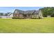 Well-maintained home featuring a spacious yard and traditional design at 3345 Little Creek Church Rd, Clayton, NC 27520