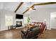 Comfortable living room with fireplace and natural light; perfect for relaxation at 3345 Little Creek Church Rd, Clayton, NC 27520