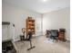 Versatile office space featuring a desk, exercise equipment, and natural light at 3345 Little Creek Church Rd, Clayton, NC 27520