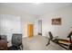 Cozy office or bonus room featuring neutral walls, carpet and natural light at 3345 Little Creek Church Rd, Clayton, NC 27520
