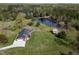 High angle of the residence, revealing the extensive lawn and outbuildings at 3540 Sellars Rd, Mebane, NC 27302