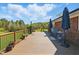Spacious rear deck featuring wood railings, patio furniture, and an outdoor cooking area at 3540 Sellars Rd, Mebane, NC 27302