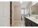 Bathroom featuring tiled floors, vanity, and shower at 3540 Sellars Rd, Mebane, NC 27302
