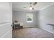 Cozy bedroom with carpet flooring, neutral color scheme, and ceiling fan at 3540 Sellars Rd, Mebane, NC 27302