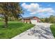 Beautiful brick home features a two-car garage and long driveway at 3540 Sellars Rd, Mebane, NC 27302