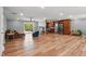 Bright living area with wood floors, modern appliances, and an open floor plan at 3540 Sellars Rd, Mebane, NC 27302