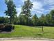 Cleared lot offers a scenic view with mature trees and shrubbery in a desirable location at 4002 Dublin Ct, Burlington, NC 27215