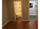 Spacious bedroom with hardwood floors connecting to the bathroom and closet at 405 Starrett Ct, Raleigh, NC 27603