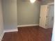 Bedroom featuring hardwood floors, a ceiling fan, and a neutral color palette at 405 Starrett Ct, Raleigh, NC 27603