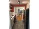View from the kitchen into the dining room, showcasing modern appliances and stylish design at 405 Starrett Ct, Raleigh, NC 27603