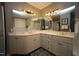 Bathroom with double vanity, framed mirrors and good lighting at 423 Oakland Dr, Raleigh, NC 27609