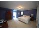 Spacious bedroom with natural light, closet, and en-suite bathroom at 423 Oakland Dr, Raleigh, NC 27609