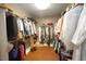 Well-organized closet space featuring shelving, hanging rods, and easy access for storage solutions at 423 Oakland Dr, Raleigh, NC 27609