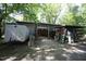 Exterior view of a large detached garage and storage area at 423 Oakland Dr, Raleigh, NC 27609