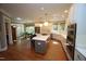 Open kitchen featuring a large island, ample counter space, modern appliances, and a view of the dining area at 423 Oakland Dr, Raleigh, NC 27609