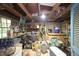 Unfinished storage area with a variety of tools, materials, and equipment stored at 423 Oakland Dr, Raleigh, NC 27609