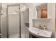 Bright bathroom with a shower and vanity at 4420 Tetbury Pl, Raleigh, NC 27613