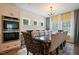 Elegant dining room with a large table, tufted chairs, and stylish light fixtures at 4455 Old Us 421, Lillington, NC 27546