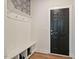 Inviting entryway with built-in bench, hooks, and storage cubbies, blending style with functionality at 4455 Old Us 421, Lillington, NC 27546