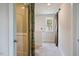 Upstairs hallway featuring a barn door for privacy and a window for natural light at 4455 Old Us 421, Lillington, NC 27546