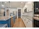 Stylish kitchen with island seating, stainless steel appliances, and granite countertops at 4455 Old Us 421, Lillington, NC 27546