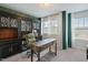 Charming home office with a large built-in desk, ample natural light, and comfortable seating at 4455 Old Us 421, Lillington, NC 27546