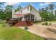 Expansive backyard featuring a wooden deck and lush green lawn at 4612 River Farm Rd, Rocky Mount, NC 27803