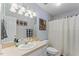 Cozy bathroom featuring a single sink vanity, and shower with tub at 4612 River Farm Rd, Rocky Mount, NC 27803